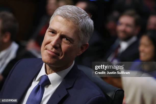 Judge Neil Gorsuch arrives for the first day of his Supreme Court confirmation hearing before the Senate Judiciary Committee in the Hart Senate...