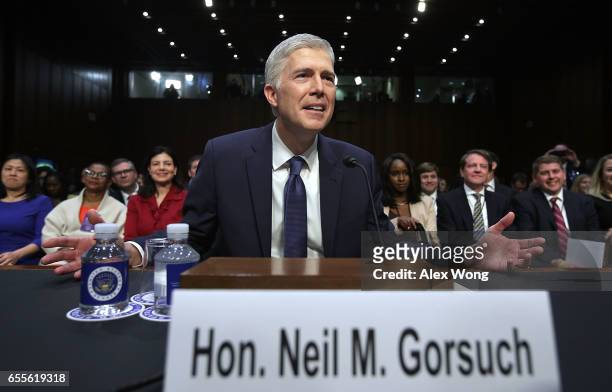 Judge Neil Gorsuch asks photographers, "Is this what you do all day? I'm sorry," after he arrived for the first day of his Supreme Court confirmation...
