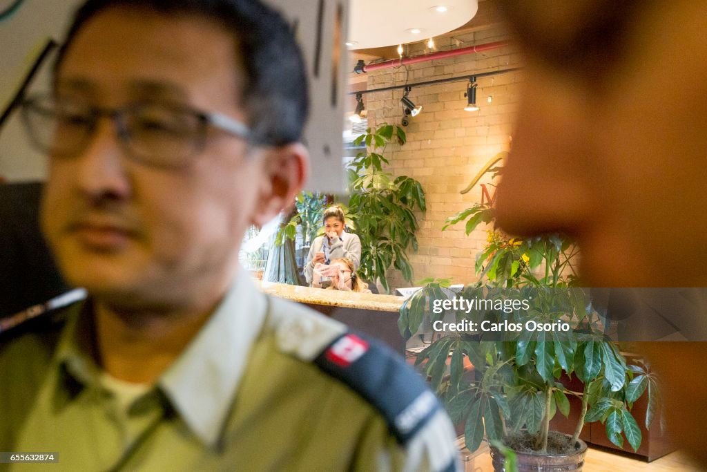 Metcap Jpg Metcap Living employees laugh and take photos of tenants waiting to ...