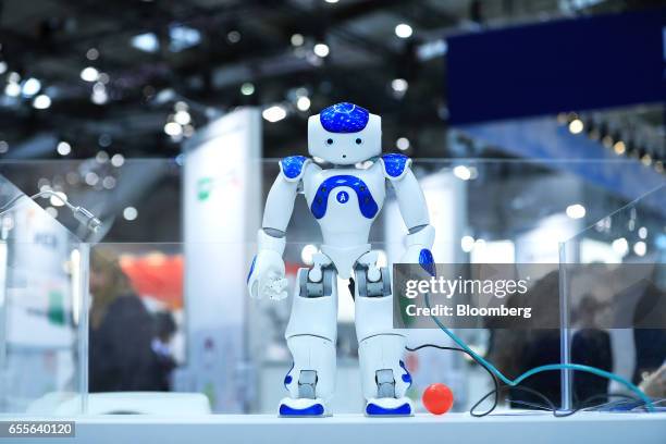 Humanoid robot, developed by Softbank Corp., stands on display at the CeBIT 2017 tech fair in Hannover, Germany, on Monday, March 20, 2017. Leading...