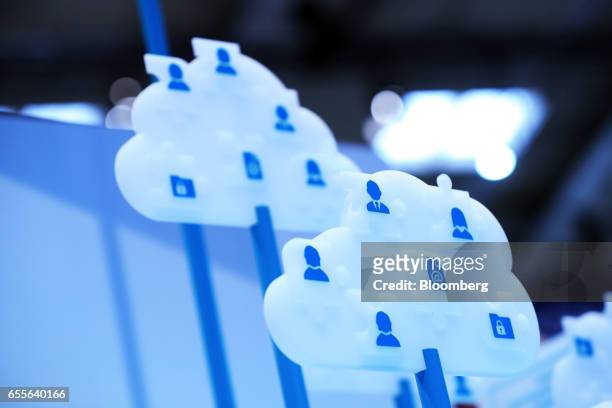 Display promotes iCloud security concepts in a pavilion at the CeBIT 2017 tech fair in Hannover, Germany, on Monday, March 20, 2017. Leading edge...