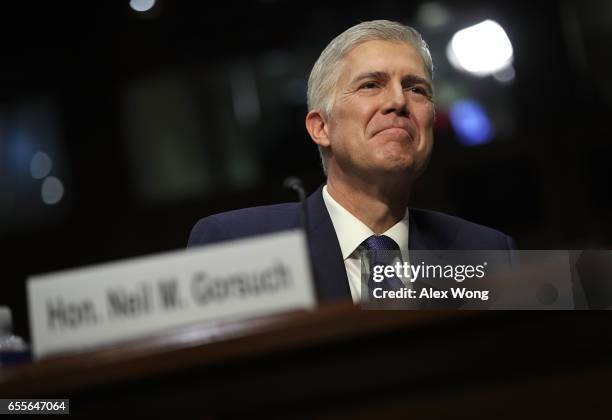Judge Neil Gorsuch listens during the first day of his Supreme Court confirmation hearing before the Senate Judiciary Committee in the Hart Senate...