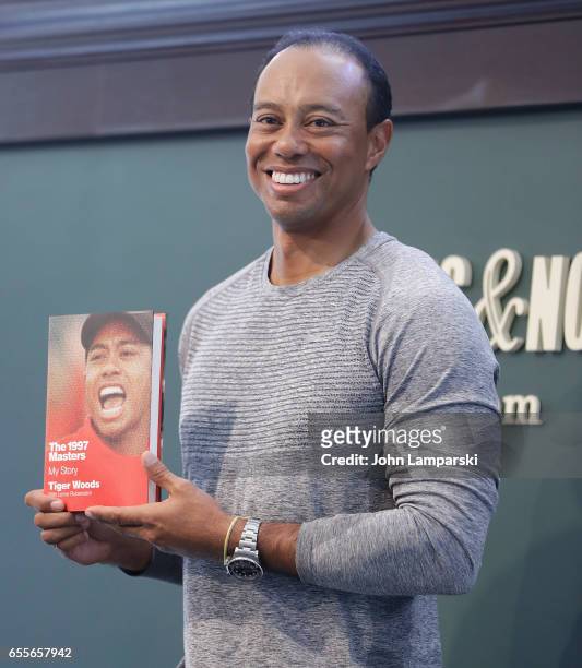 Professional golf player, Tiger Woods signs copies of his new book "The 1997 Masters: My Story" at Barnes & Noble Union Square on March 20, 2017 in...