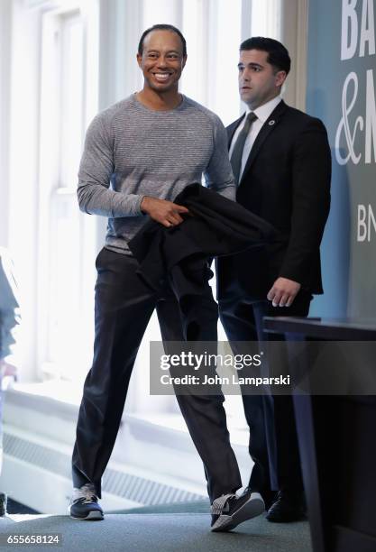 Professional golf player, Tiger Woods signs copies of his new book "The 1997 Masters: My Story" at Barnes & Noble Union Square on March 20, 2017 in...