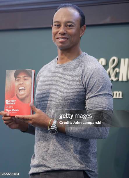 Professional golf player, Tiger Woods signs copies of his new book "The 1997 Masters: My Story" at Barnes & Noble Union Square on March 20, 2017 in...