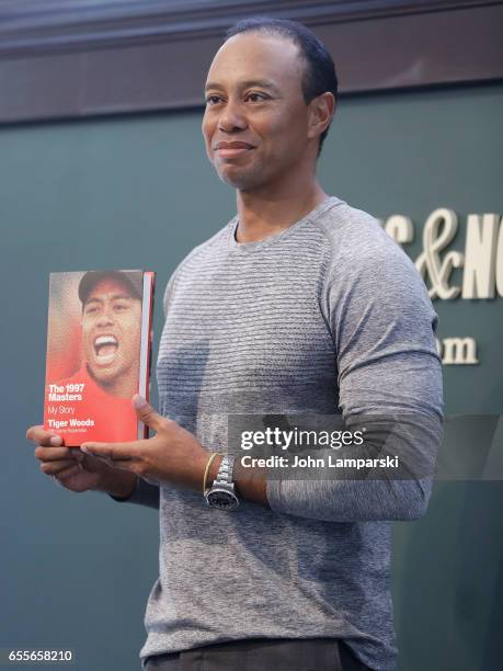 Professional golf player, Tiger Woods signs copies of his new book "The 1997 Masters: My Story" at Barnes & Noble Union Square on March 20, 2017 in...