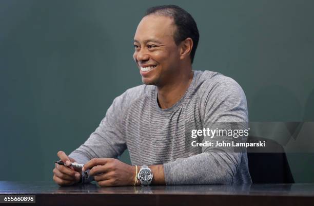 Professional golf player, Tiger Woods signs copies of his new book "The 1997 Masters: My Story" at Barnes & Noble Union Square on March 20, 2017 in...