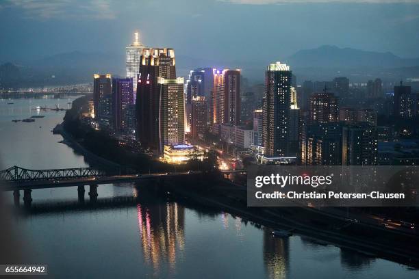 ryomyong street new construction - north korea night stock pictures, royalty-free photos & images