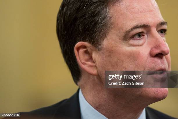 James Comey, Director of the Federal Bureau of Investigation , testifies during a House Permanent Select Committee on Intelligence hearing concerning...