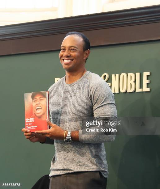 Tiger Woods signs copies of his new book, "The 1997 Masters: My Story" at Barnes & Noble Union Square on March 20, 2017 in New York City.