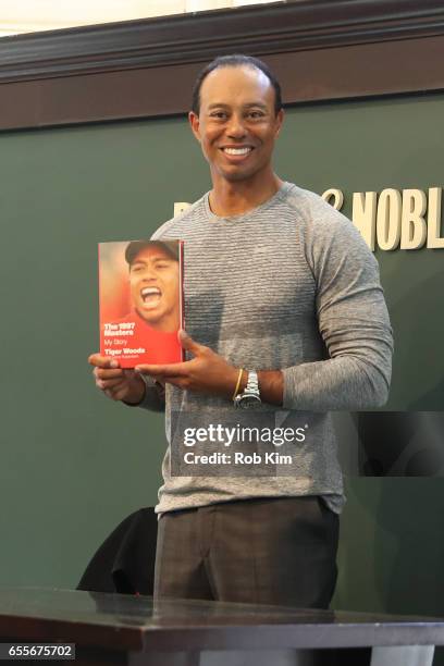 Tiger Woods signs copies of his new book, "The 1997 Masters: My Story" at Barnes & Noble Union Square on March 20, 2017 in New York City.