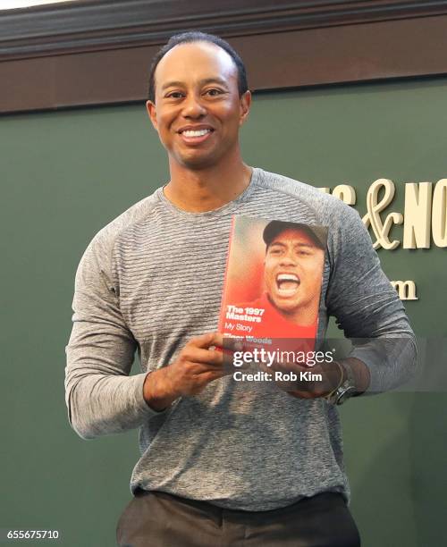 Tiger Woods signs copies of his new book, "The 1997 Masters: My Story" at Barnes & Noble Union Square on March 20, 2017 in New York City.