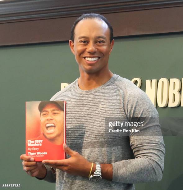 Tiger Woods signs copies of his new book, "The 1997 Masters: My Story" at Barnes & Noble Union Square on March 20, 2017 in New York City.