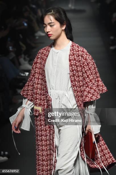 Model showcases designs on the runway during the tilt tokyo show as a part of Amazon Fashion Week Tokyo A/W 2017 at Shibuya Hikarie on March 20, 2017...