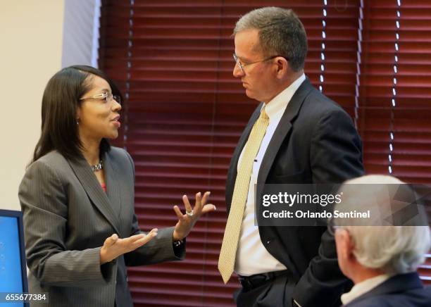 Orange/Osceola State Attorney Aramis Ayala, left, chats Monday, March 20, 2017 with State Attorney Brad King, District 5, the newly appointed...