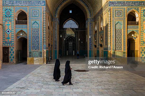 women at jameh mosque - burka stock pictures, royalty-free photos & images