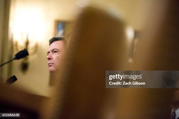 James Comey, Director of the Federal Bureau of Investigation , testifies during a House Permanent Select Committee on Intelligence hearing concerning...