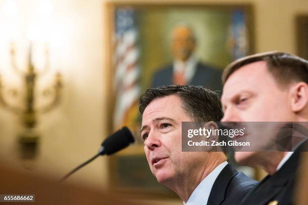 James Comey, Director of the Federal Bureau of Investigation , testifies during a House Permanent Select Committee on Intelligence hearing concerning...