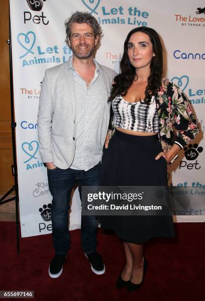 Comedy duo/husband & wife Nick Afka Thomas and Sarah Ann Masse attend the Let The Animals Live Gala at the Olympic Collection Banquet & Conference...