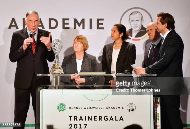 Bernd Schroeder , the former head coach of the women's team of 1.FFC Turbine Potsdam get the coach lifetime award 2016 from Steffi Jones, head coach...