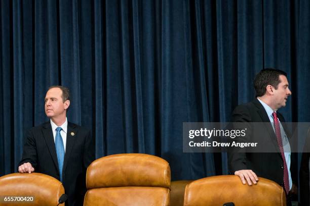 Ranking member Rep. Adam Schiff and chairman Rep. Devin Nunes prepare to take their seats after a break during a House Permanent Select Committee on...