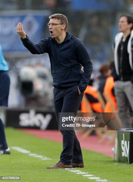 Head coach Peter Knaebel of Hamburg gestures during the Bundesliga match between Bayer 04 Leverkusen and Hamburger SV at BayArena on April 4, 2015 in...