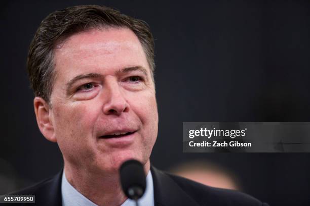 James Comey, Director of the Federal Bureau of Investigation , testifies during a House Permanent Select Committee on Intelligence hearing concerning...