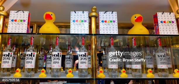 Bottles of Voli 305 vodka are displayed at Sugar Factory American Brasserie at the Fashion Show mall during Pitbull's announcement of his Voli 305...