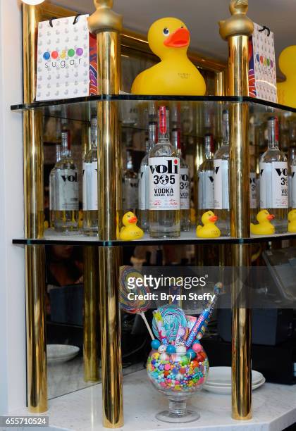 Bottles of Voli 305 vodka are displayed at Sugar Factory American Brasserie at the Fashion Show mall during Pitbull's announcement of his Voli 305...