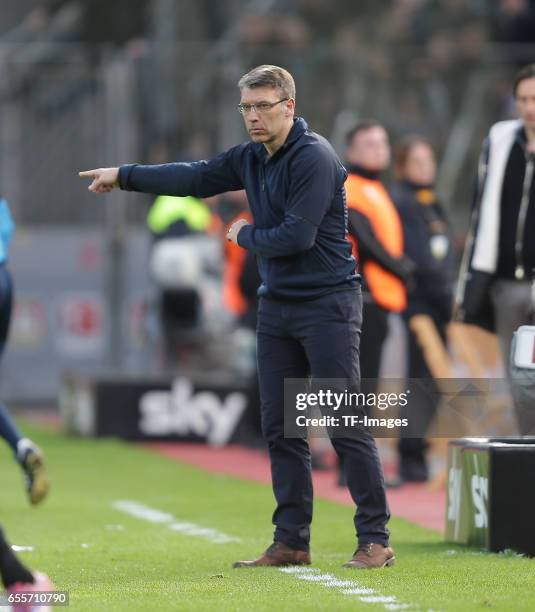 Head coach Peter Knaebel of Hamburg gestures during the Bundesliga match between Bayer 04 Leverkusen and Hamburger SV at BayArena on April 4, 2015 in...