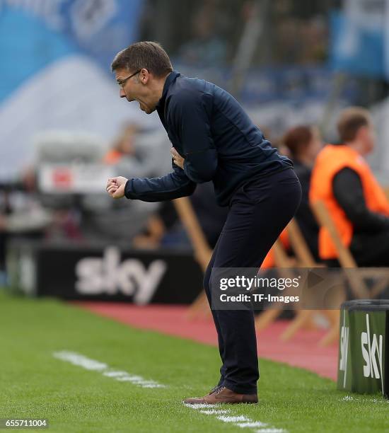 Head coach Peter Knaebel of Hamburg gestures during the Bundesliga match between Bayer 04 Leverkusen and Hamburger SV at BayArena on April 4, 2015 in...