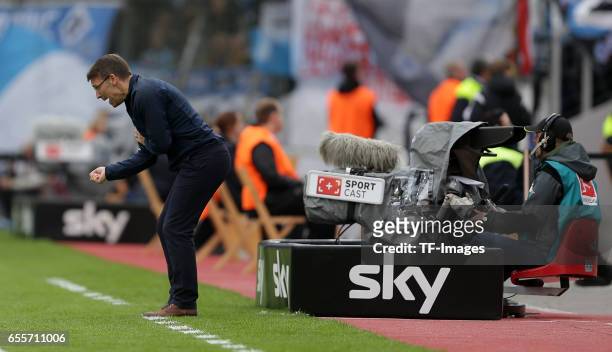 Head coach Peter Knaebel of Hamburg gestures during the Bundesliga match between Bayer 04 Leverkusen and Hamburger SV at BayArena on April 4, 2015 in...