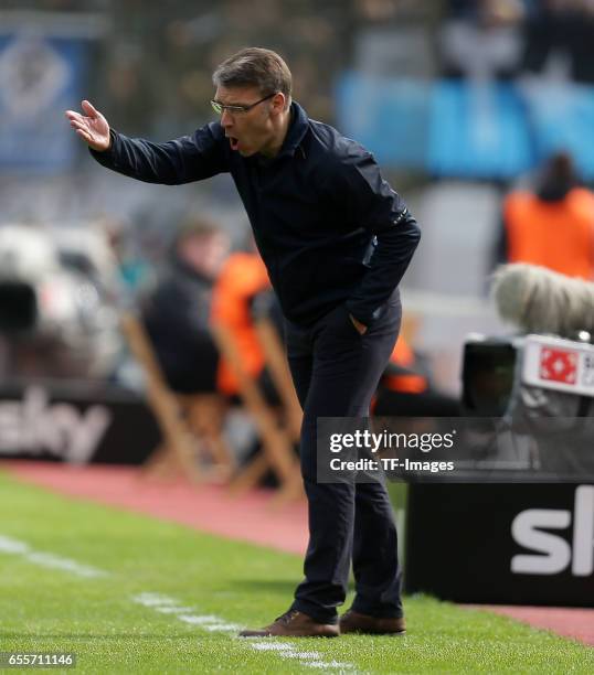 Head coach Peter Knaebel of Hamburg gestures during the Bundesliga match between Bayer 04 Leverkusen and Hamburger SV at BayArena on April 4, 2015 in...