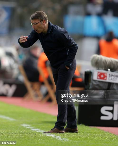 Head coach Peter Knaebel of Hamburg gestures during the Bundesliga match between Bayer 04 Leverkusen and Hamburger SV at BayArena on April 4, 2015 in...