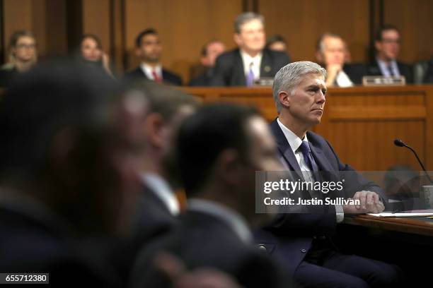 Judge Neil Gorsuch looks on during the first day of his Supreme Court confirmation hearing before the Senate Judiciary Committee in the Hart Senate...