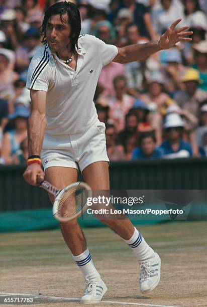 Romanian tennis player Ilie Nastase pictured during competition to reach the quarterfinals of the Men's singles tournament at the Wimbledon Lawn...