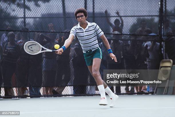 American tennis player Arthur Ashe pictured in action during competition to progress to reach the fourth round of the 1978 US Open Men's Singles...