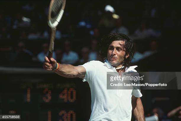Romanian tennis player Ilie Nastase pictured during competition to reach the quarterfinals of the Men's singles tournament at the Wimbledon Lawn...