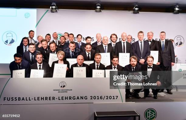 New Coachs, DFB president Reinhard Grindel and DFB officials stand together for a family foto during the 'Coaching Award Ceremony & Closing Event...