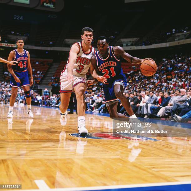 Gerald Wilkins of the Cleveland Cavaliers dribbles against the New Jersey Nets circa 1993 at the Contintental Airlines Arena in East Rutherford, New...