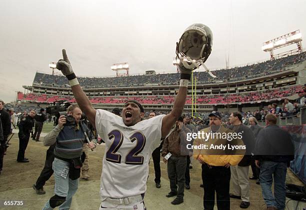Duane Starks of the Baltimore Ravens celebrates during the AFC Divisional Playoffs Game against the Tennessee Titans at the Adelphia Coliseum in...