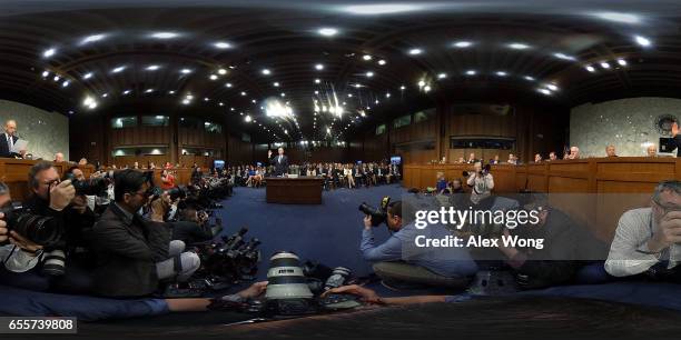 Judge Neil Gorsuch is sworn in by Committee Chairman Sen. Chuck Grassley during the first day of his Supreme Court confirmation hearing before the...