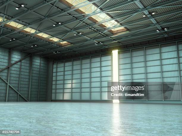 empty warehouse by day - warehouse background stock pictures, royalty-free photos & images