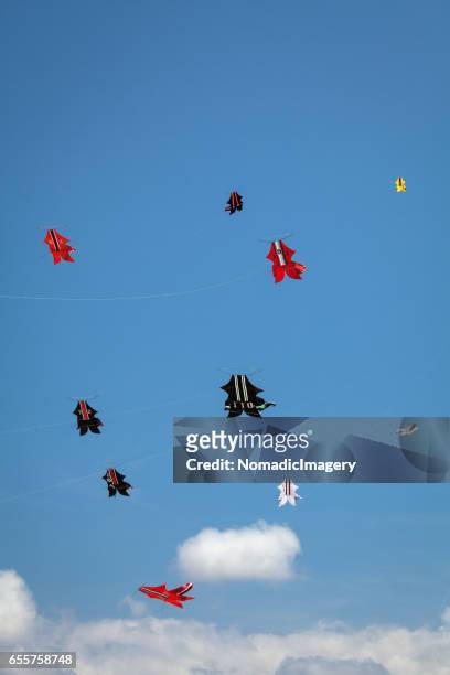 group of kites flying in the sky on bali island - indonesian kite stock pictures, royalty-free photos & images