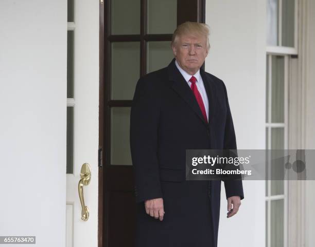 President Donald Trump waits for the arrival of Haider al-Abadi, Iraq's prime minister, not pictured, at the White House in Washington, D.C., U.S.,...