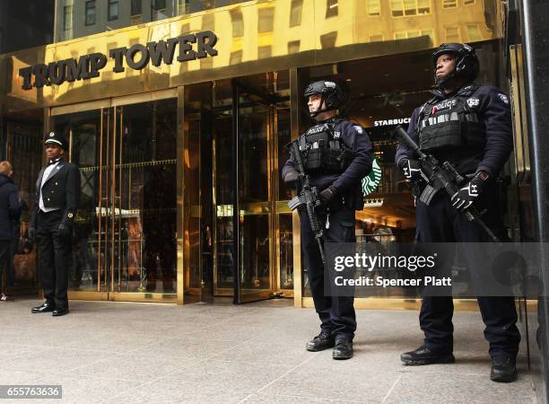 Counter terrorism officers stand in front of Trump Tower in Manhattan on March 20, 2017 in New York City. Senate Minority Leader Chuck Schumer has...