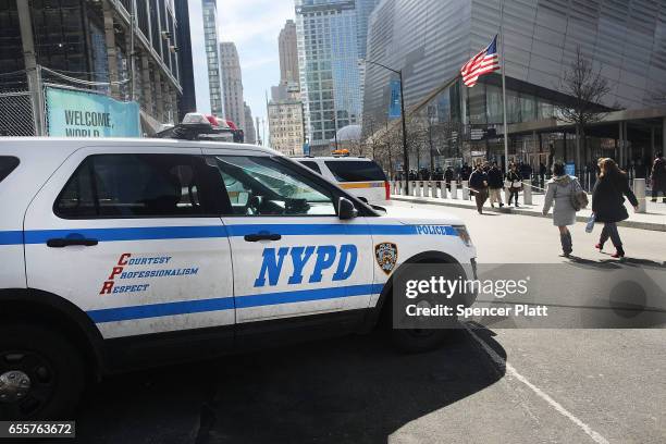 Police car sits in front of One World Trade at ground zero in Manhattan on March 20, 2017 in New York City. Senate Minority Leader Chuck Schumer has...
