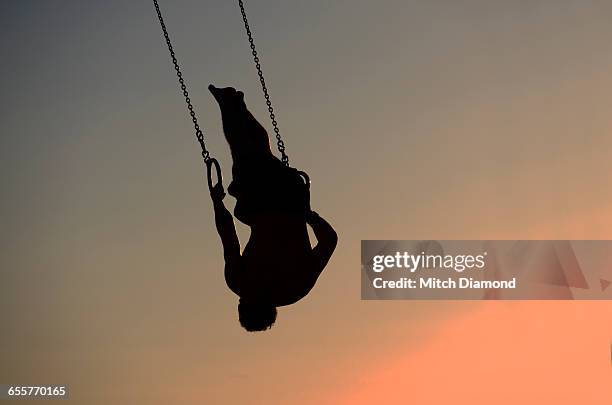 young man on high sports rings - gymnastic rings equipment bildbanksfoton och bilder