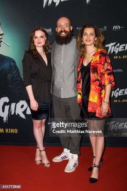 Director Jakob Lass, Ella Rumpf and Maria Dragus attend the premiere of the film 'Tiger Girl' at Zoo Palast on March 20, 2017 in Berlin, Germany.