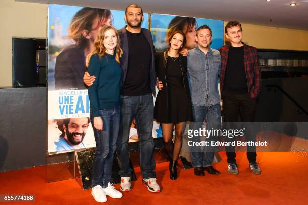 Isabelle Carre, Ramzy Bedia, Maria Duplaa, Olivier Peyon, and Olivier Ruidavet attend the "Une Vie Ailleurs" Paris Premiere at UGC Cine Cite des...